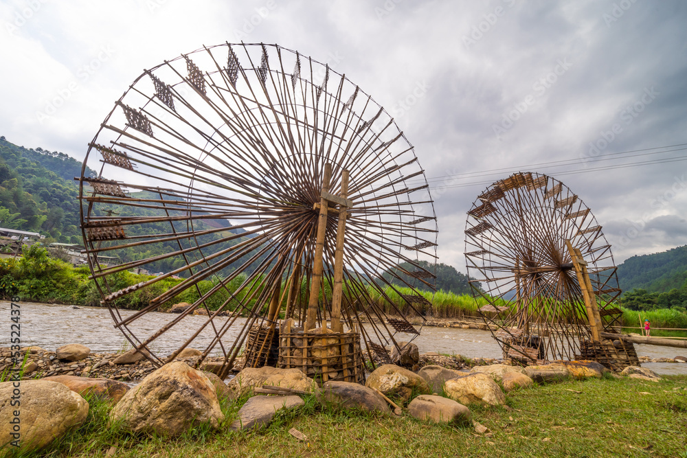 Fototapeta premium view of Water mill in Mu Cang Chai, Yen Bai province, Vietnam in a summer day