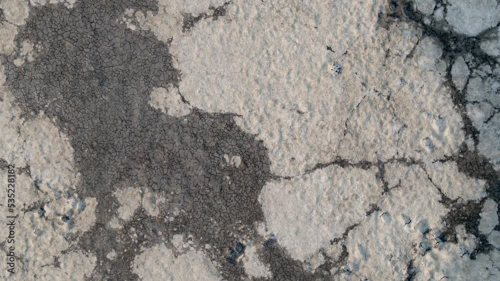 Cracked earth from drought. Global warming, cataclysm. Climate change and dry weather. Economic crisis, food crisis. Poor harvest due to dry weather. Soil erosion. The dried-up mouth of the river. Cracked earth from drought. Global warming, cataclysm. Climate change and dry weather. Economic crisis, food crisis. Poor harvest due to dry weather. Soil erosion. The dried-up mouth of the river.