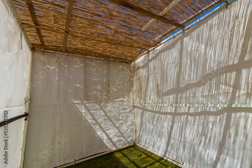 A white building of a public Sukkah, before the Sukkot holiday, in Ein Hamad Park in Jerusalem