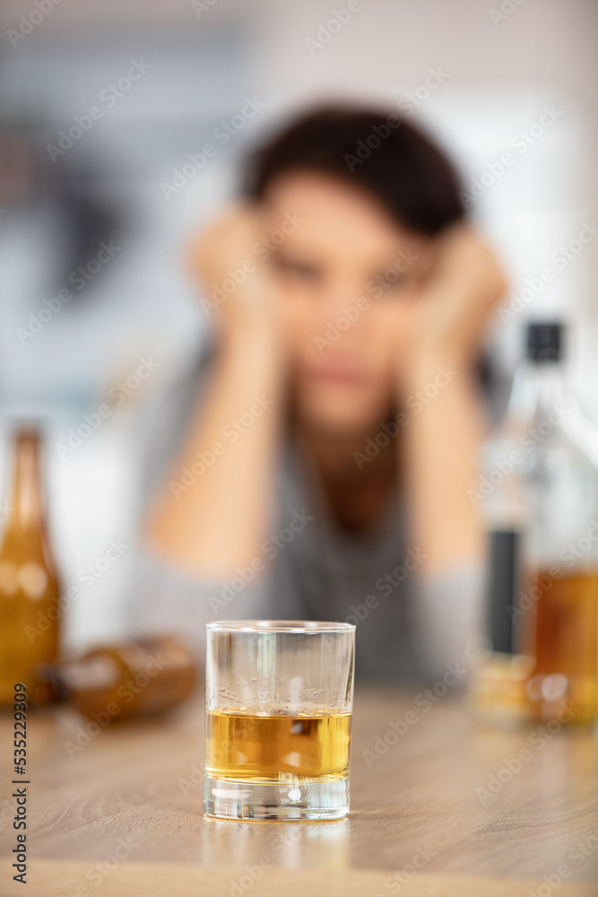 young beautiful woman drinking alcohol young beautiful woman drinking alcohol