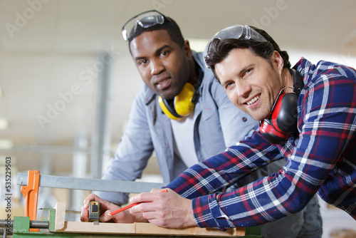 a carpenter and his apprentice photo