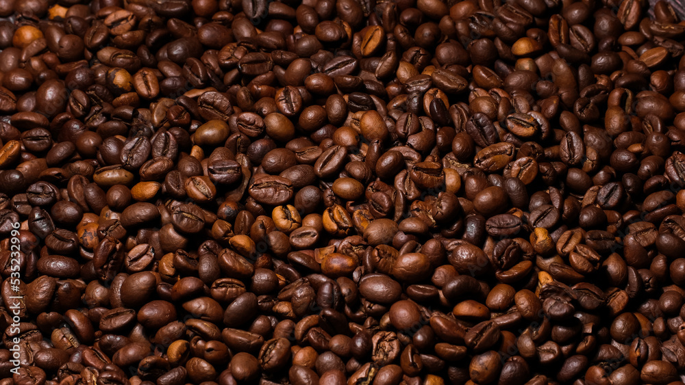 Dark background of roasted coffee beans. Dark background of roasted coffee beans.