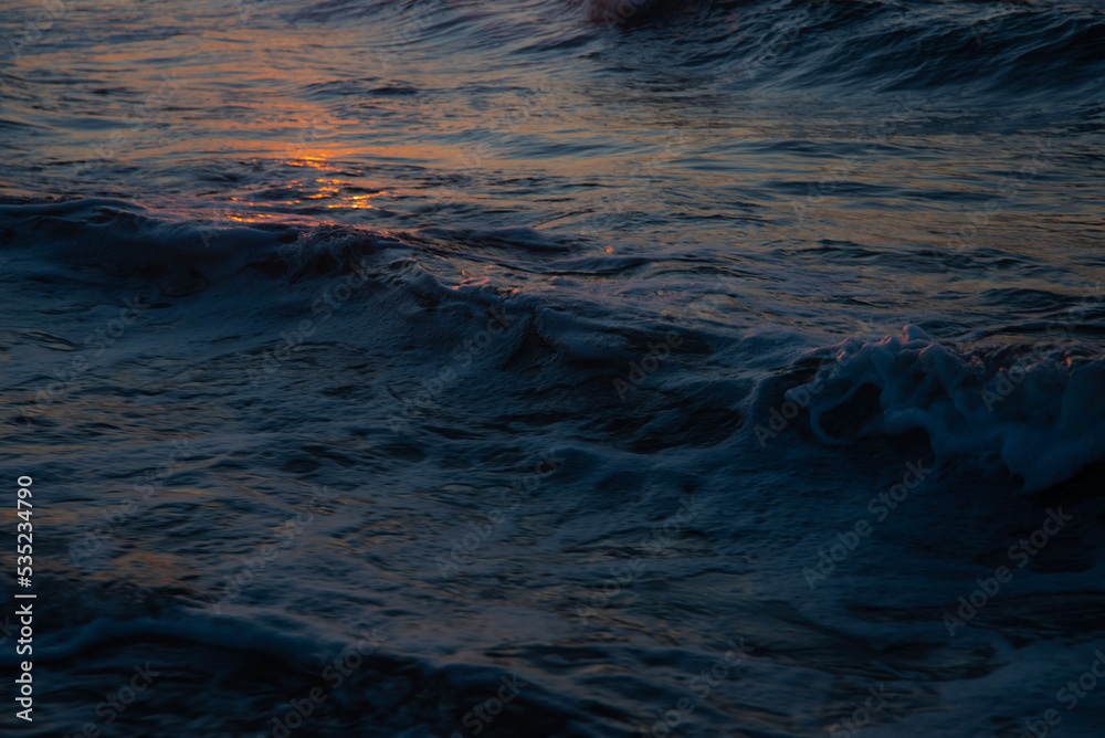 waves at sunset