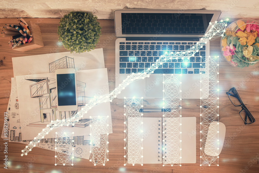 Obraz premium Multi exposure of financial chart drawing over table background with computer. Concept of research. Top view.