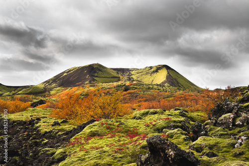 Grábrók Crater Landscape in Autumn/Fall with Lava Field and Autumnal Colored Trees in West Iceland photo