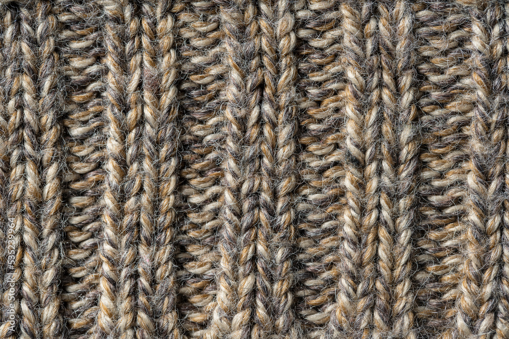 Knit fabric texture or background . Textile, scarf or sweater textured surface. Warm accessories, clothing, fashion concept. Closeup view Knit fabric texture or background . Textile, scarf or sweater textured surface. Warm accessories, clothing, fashion concept. Closeup view