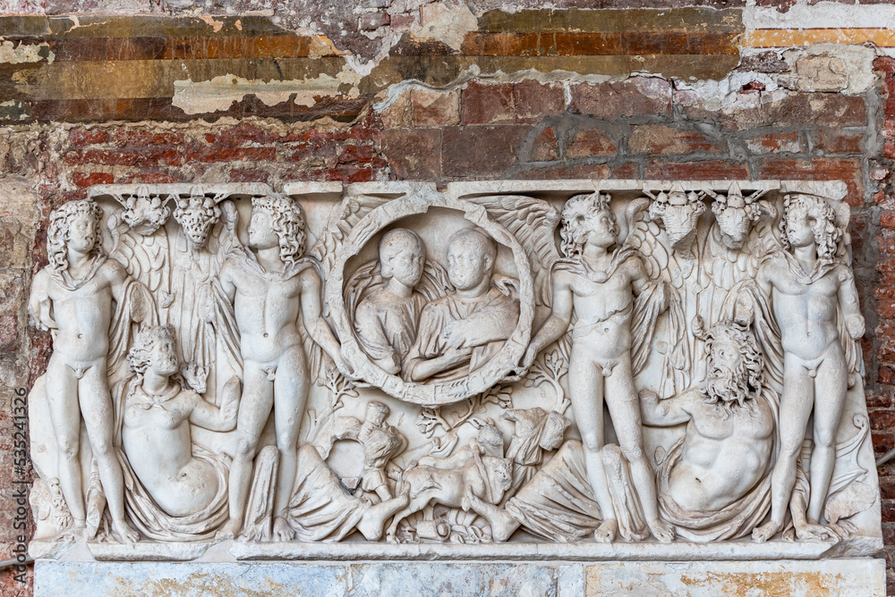 Carved sculptures in marble decorating tomb of ancient roman old couple Carved sculptures in marble decorating tomb of ancient roman old couple