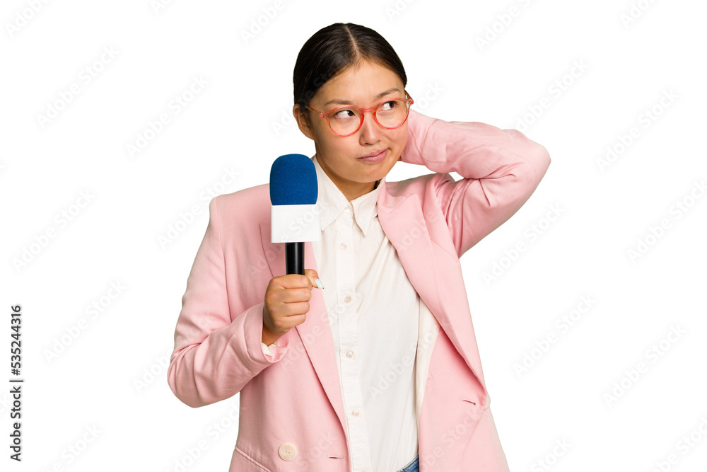 Young TV Asian presenter isolated on green chroma background touching back of head, thinking and making a choice. Young TV Asian presenter isolated on green chroma background touching back of head, thinking and making a choice.