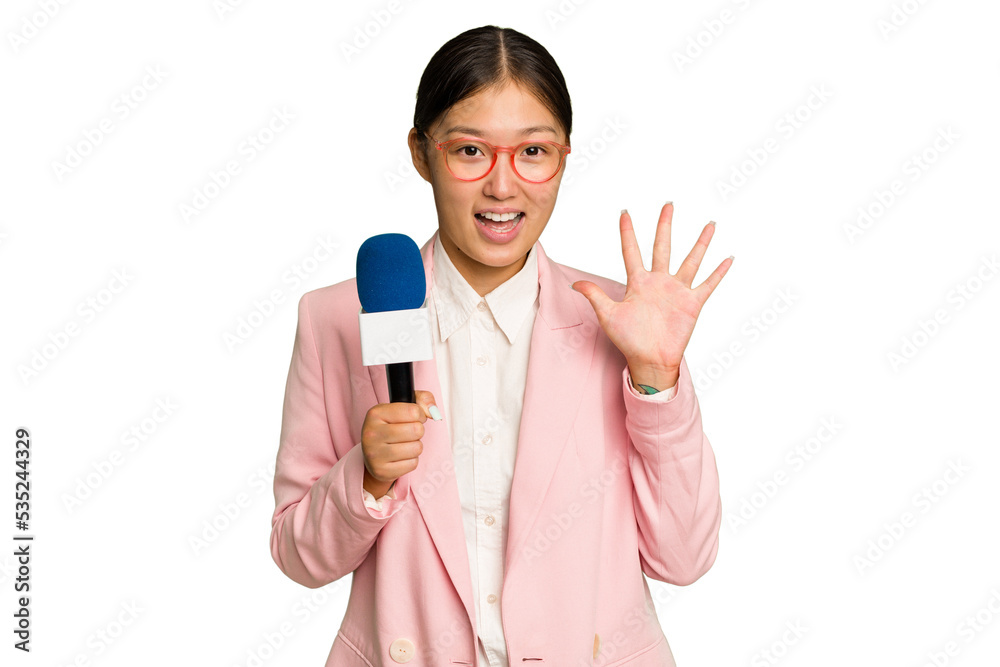 Young TV Asian presenter isolated on green chroma background smiling cheerful showing number five with fingers. Young TV Asian presenter isolated on green chroma background smiling cheerful showing number five with fingers.