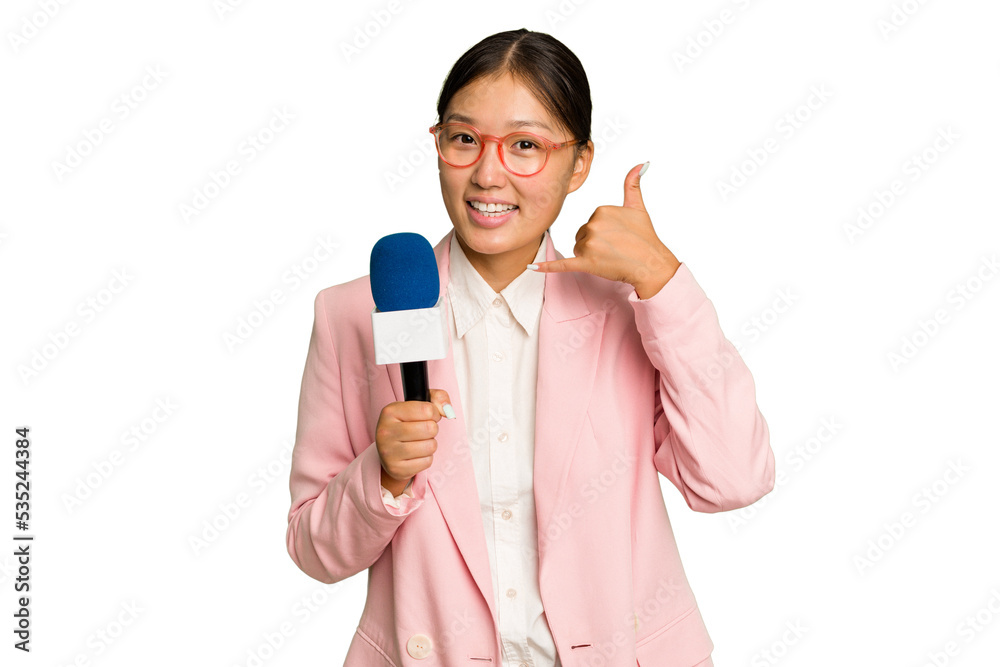 Young TV Asian presenter isolated on green chroma background showing a mobile phone call gesture with fingers. Young TV Asian presenter isolated on green chroma background showing a mobile phone call gesture with fingers.