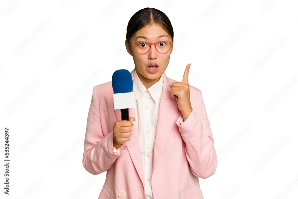 Young TV Asian presenter isolated on green chroma background having some great idea, concept of creativity. Young TV Asian presenter isolated on green chroma background having some great idea, concept of creativity.