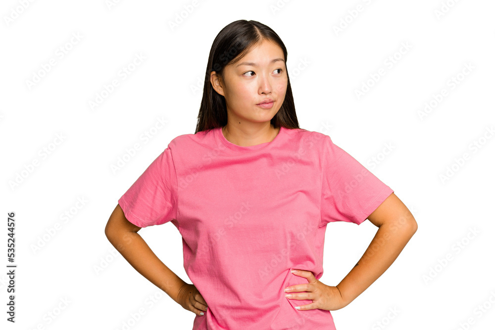 Young Asian woman isolated on green chroma background confused, feels doubtful and unsure. Young Asian woman isolated on green chroma background confused, feels doubtful and unsure.