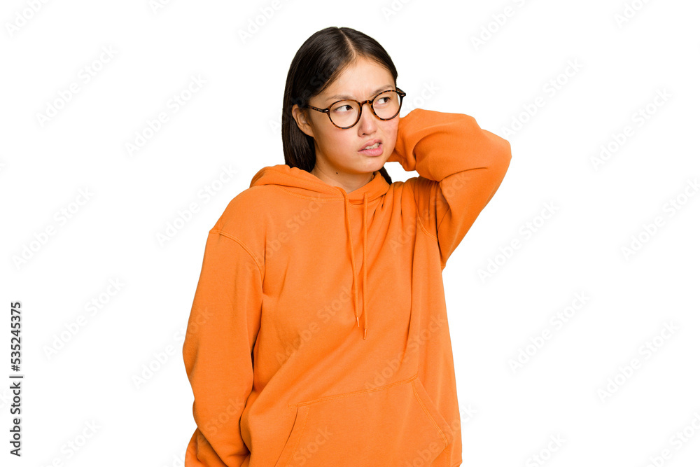 Young Asian woman isolated on green chroma background tired and very sleepy keeping hand on head. Young Asian woman isolated on green chroma background tired and very sleepy keeping hand on head.