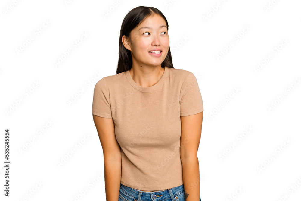Young Asian woman isolated on green chroma background laughs and closes eyes, feels relaxed and happy. Young Asian woman isolated on green chroma background laughs and closes eyes, feels relaxed and happy.