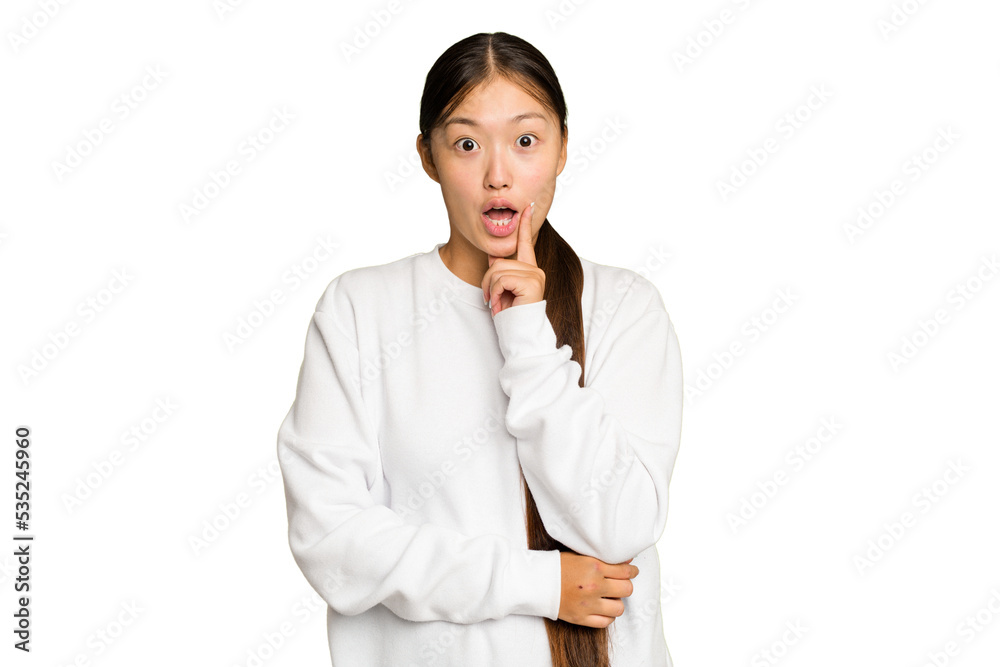 Young Asian woman isolated on green chroma background having some great idea, concept of creativity. Young Asian woman isolated on green chroma background having some great idea, concept of creativity.