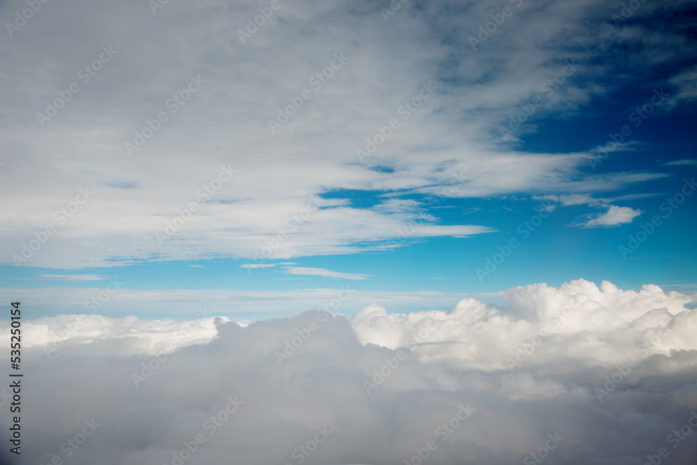 Above clouds from airplane window Above clouds from airplane window