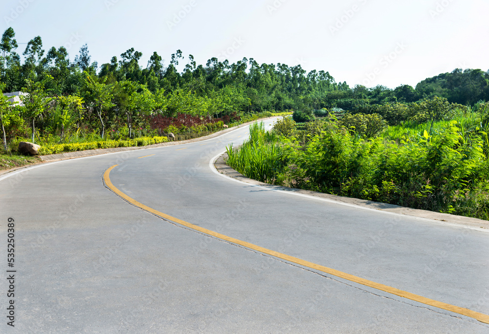 Fototapeta premium Empty curved road on mountain