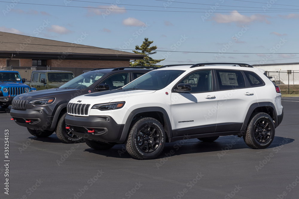 Jeep Cherokee display at a dealership. Jeep offers the Cherokee in