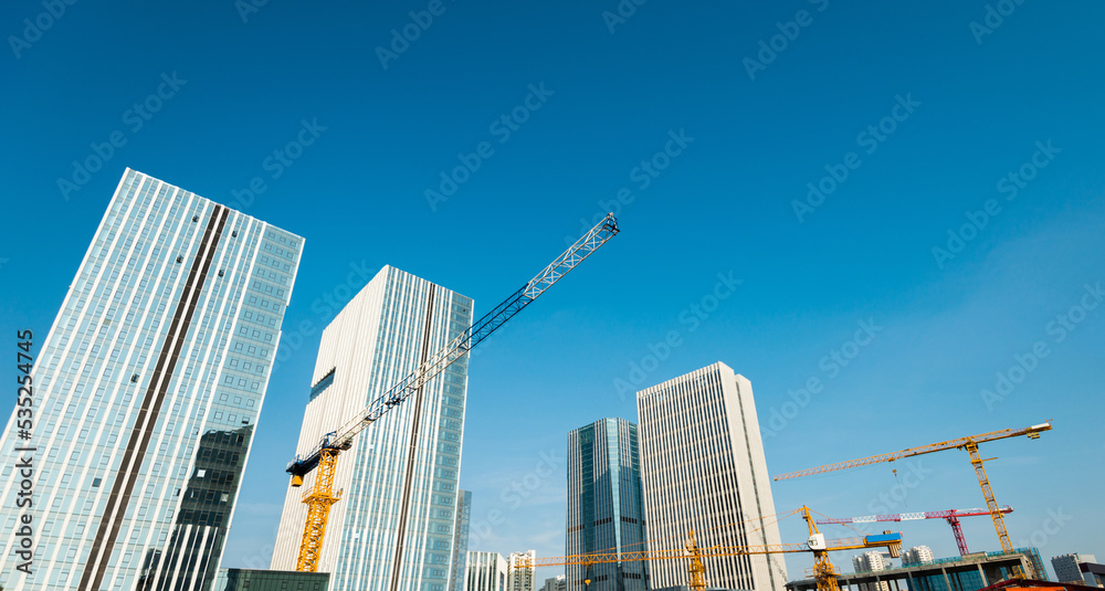 Naklejka premium Modern office tower building under construction