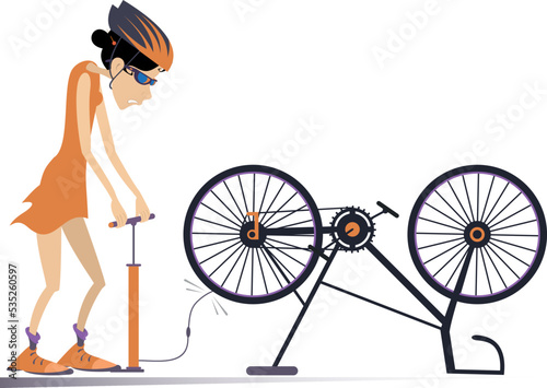 Cyclist and a broken bicycle. Sportsperson woman repairs the bicycle. 
The cyclist woman inflates the wheel on the bicycle. Isolated on white background
