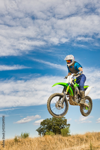 Fototapeta Naklejka Na Ścianę i Meble -  Motocross rider jumping.