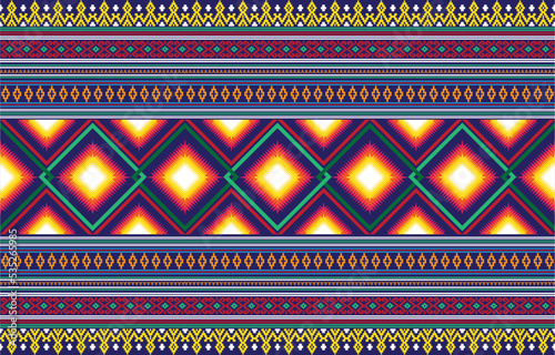 tribal ethnic themes geometric seamless background with a Peruvian american indigenous pattern. Textile print with rich native American tribal themes in an ethnic traditional style. Clothing with Nava photo