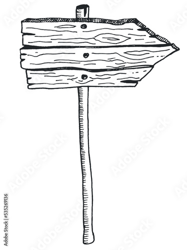 A wooden road sign with a pointed end in the form of an arrow showing the direction.