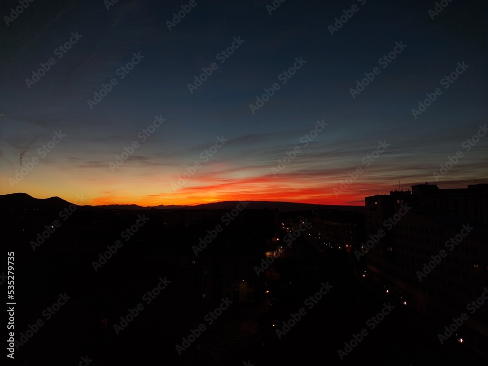 Yellow and orange sky background. Beautiful sky with clouds in yellow background