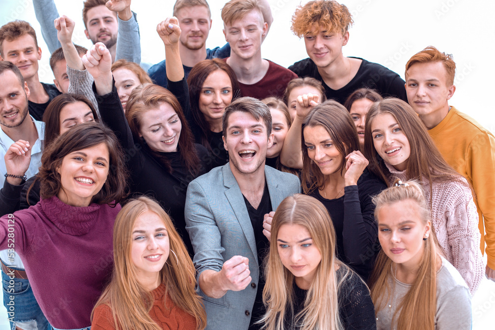 close up. happy young people showing their success close up. happy young people showing their success
