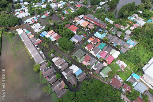 High-angle view of the Great Flood, Meng District, Thailand, on October 3, 2022, is a photograph from real flooding. With a slight color adjustment
