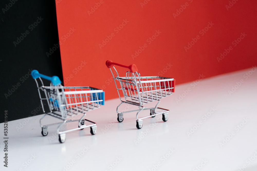 Mini shopping cart shop concept. Empty top view mini shopping cart or trolley shopping on background, concept shopping in supermarket.