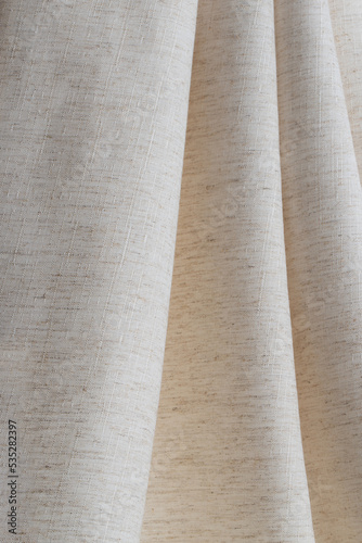 fragment of twill weave cotton fabric natural color