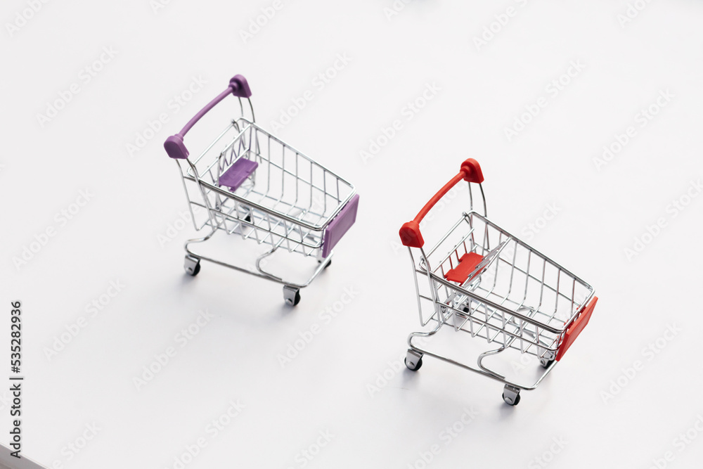 Empty top view mini shopping cart or trolley shopping on white background, concept shopping in supermarket. Empty top view mini shopping cart or trolley shopping on white background, concept shopping in supermarket.