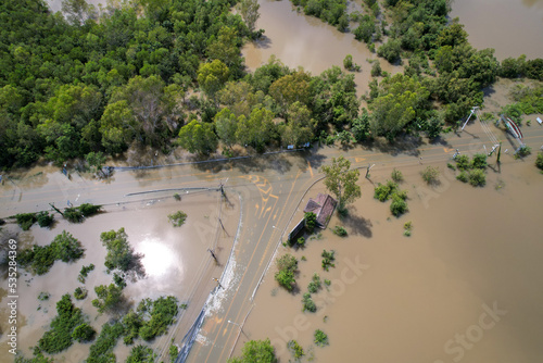 High-angle view of the Great Flood, Meng District, Thailand, on October 3, 2022, is a photograph from real flooding. With a slight color adjustment
