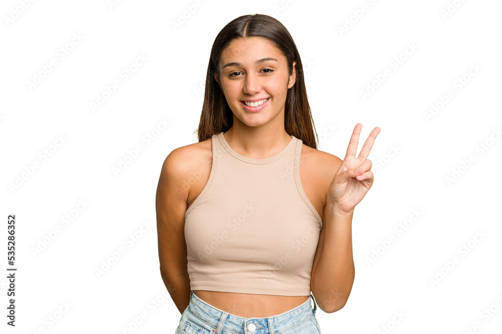 Young Indian woman isolated cutout removal background showing victory sign and smiling broadly. Young Indian woman isolated cutout removal background showing victory sign and smiling broadly.