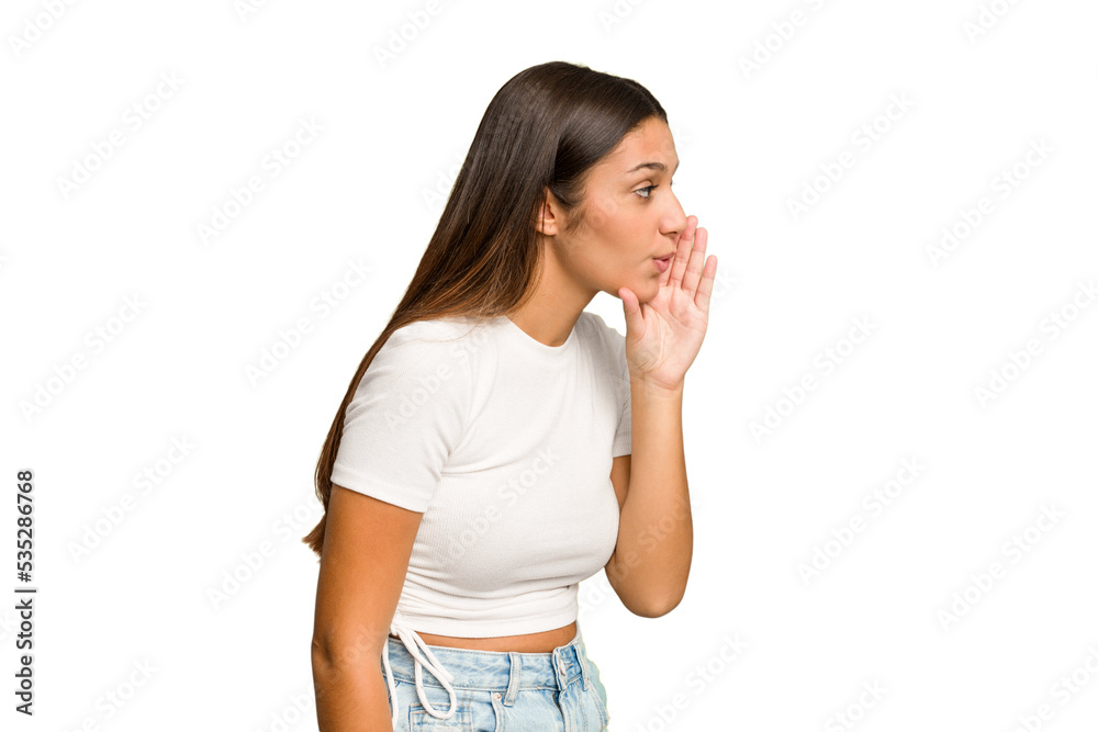 Young Indian woman isolated cutout removal background is saying a secret hot braking news and looking aside Young Indian woman isolated cutout removal background is saying a secret hot braking news and looking aside
