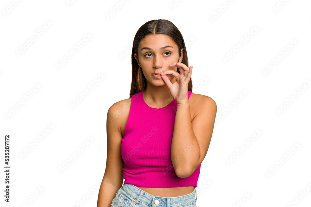 Young Indian woman isolated cutout removal background with fingers on lips keeping a secret. Young Indian woman isolated cutout removal background with fingers on lips keeping a secret.