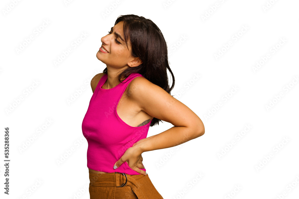 Young Indian woman isolated on green chroma background suffering a back pain. Young Indian woman isolated on green chroma background suffering a back pain.