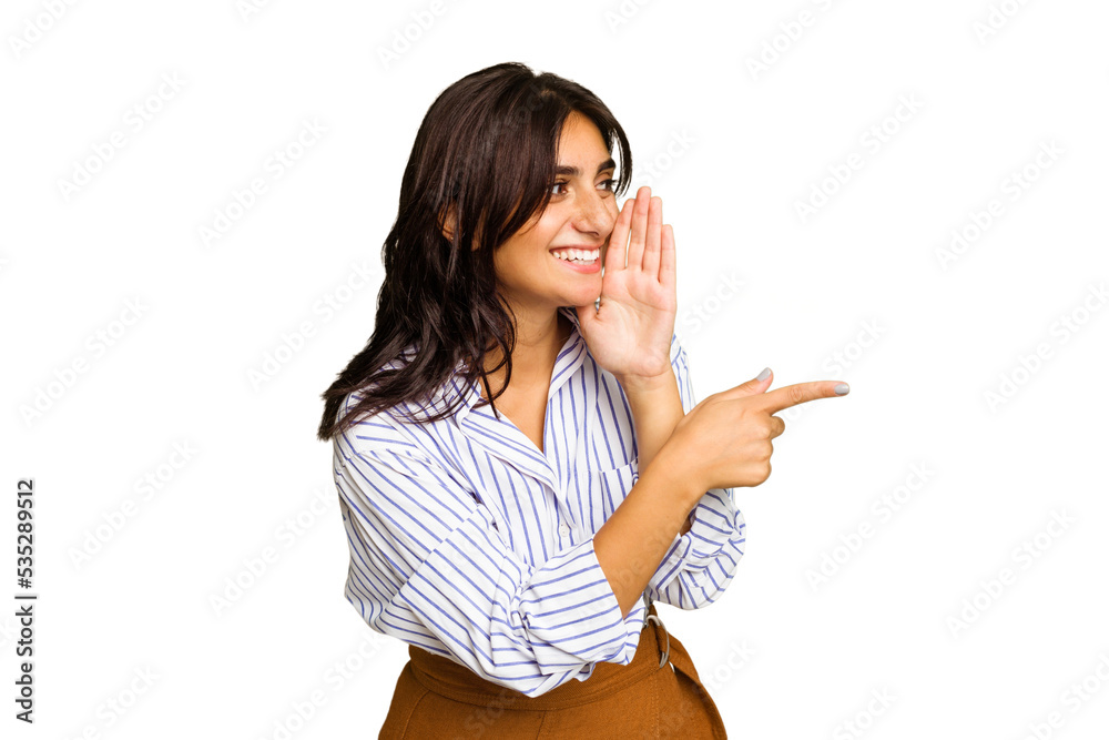 Young Indian woman isolated on green chroma background saying a gossip, pointing to side reporting something. Young Indian woman isolated on green chroma background saying a gossip, pointing to side reporting something.