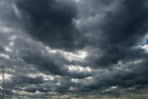 Dark and dramatic storm clouds on the sky