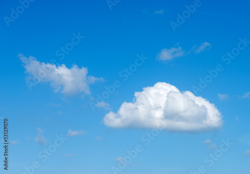Two clouds on blue sky