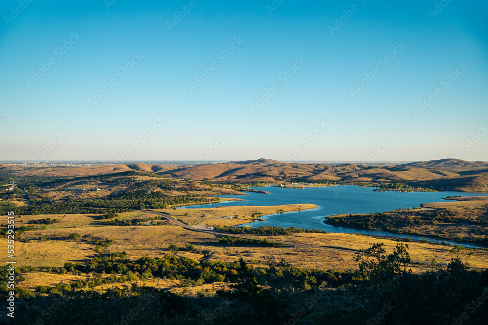 Sunset over a lake in the Wichita Mountains in Oklahoma, North America