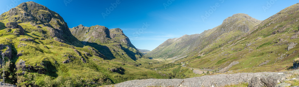A panorama of the three sisters of Glencoe and surrounding valley