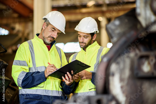 Portrait of young male surveyor on construction site