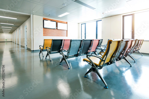 Spacious waiting room in a modern hospital photo