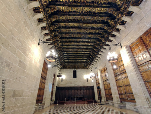 Tribunal del Mar room with a richly decorated ceiling. Second floor in the Llotja de la Seda. Valencia, Spain.  photo