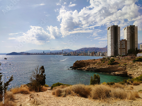View from Corner of Loix with Punta dels Pinets to the mountain of Tossal de la Cala. Benidorm, Costa Blanca, Spain. photo