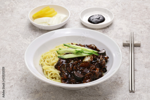 Jajangmyeon is a popular Korean Chinese dish known as Korean black bean noodles. photo