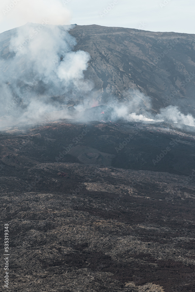 Obraz premium Volcanic Landscape with Smoke – Dramatic Nature Scenery