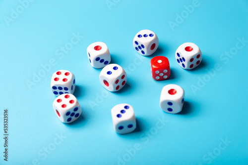 Game dice with copy space on a blue background. Concept for games  game board  presentation  banners or web. View from above. Close-up.